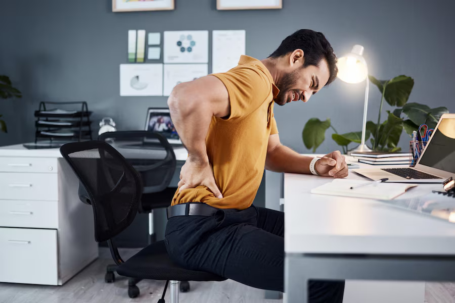 business-man-night-back-pain-stress-office-desk-modern-workplace-asian-male-entrepreneur-with-injury-health-physical-burnout-problem-while-tired-working-late